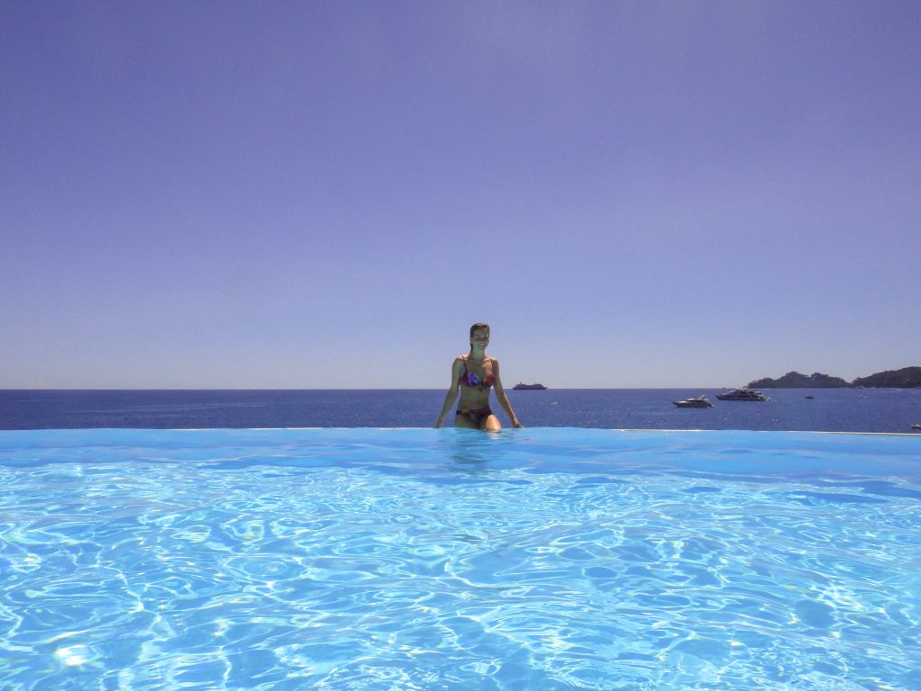 A girl in infinity pool at Excelsior Palace Hotel in Rapallo