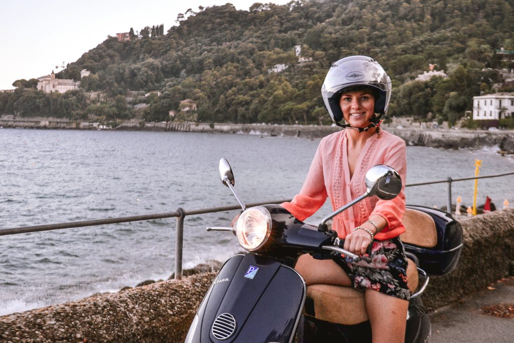 A girl on vespa in Portofino
